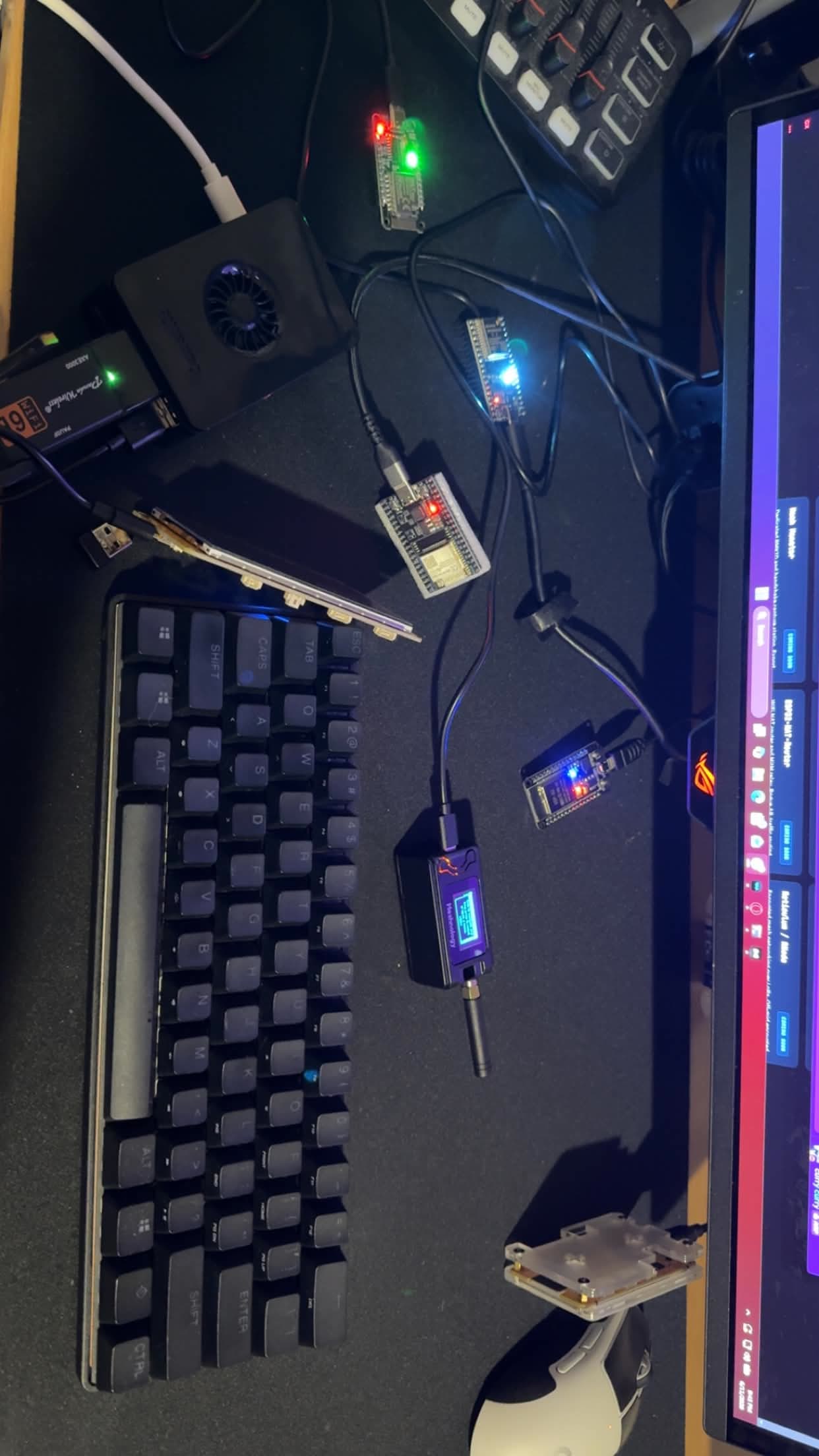 A bench of ESP32 boards being integrated into Cyber Controller