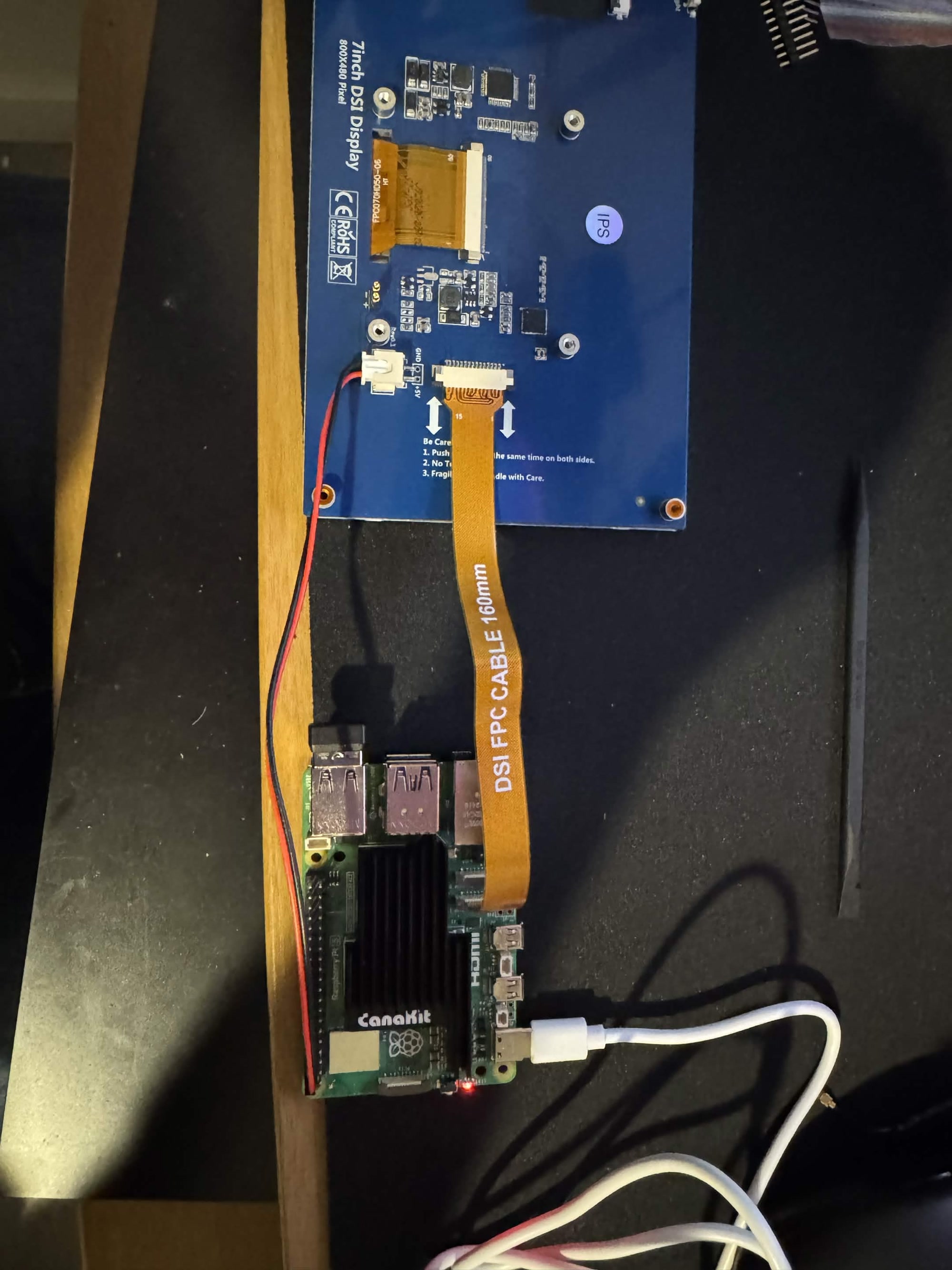 A 7-inch DSI IPS display wired to a Raspberry Pi